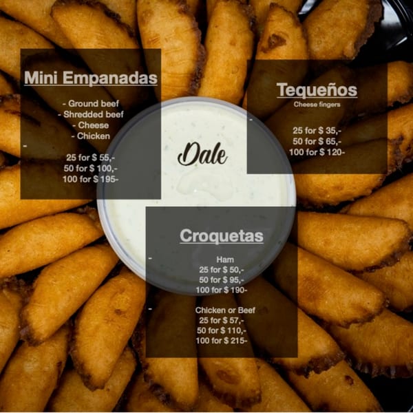A platter of golden-fried Venezuelan mini empanadas, tequeños, and croquetas with a dipping sauce.